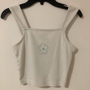 Super cute and simple flower embroidered tank top.